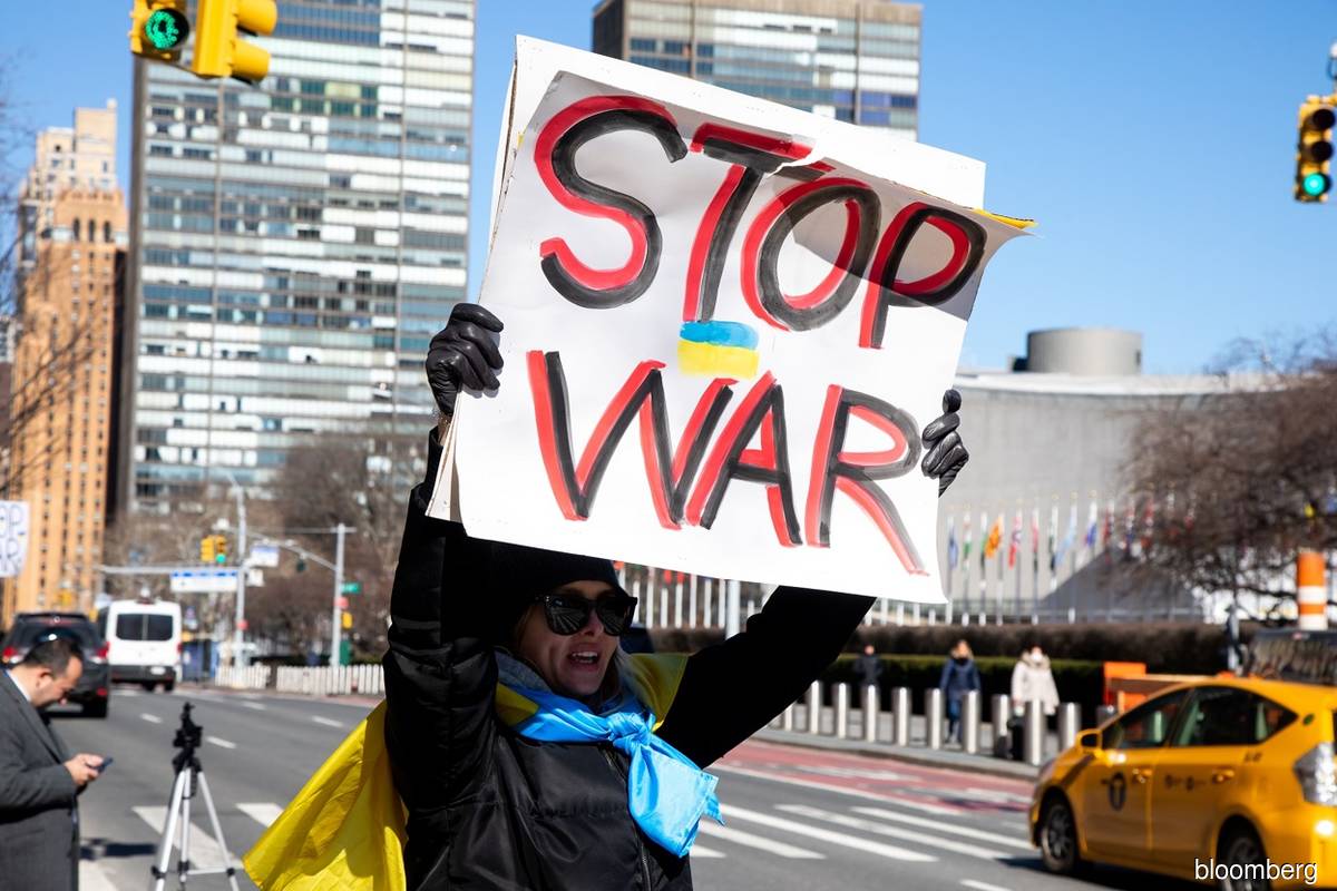 A demonstrator during a protest against the Russian invasion of Ukraine in front of the UN Headquarters in New York on Feb 28